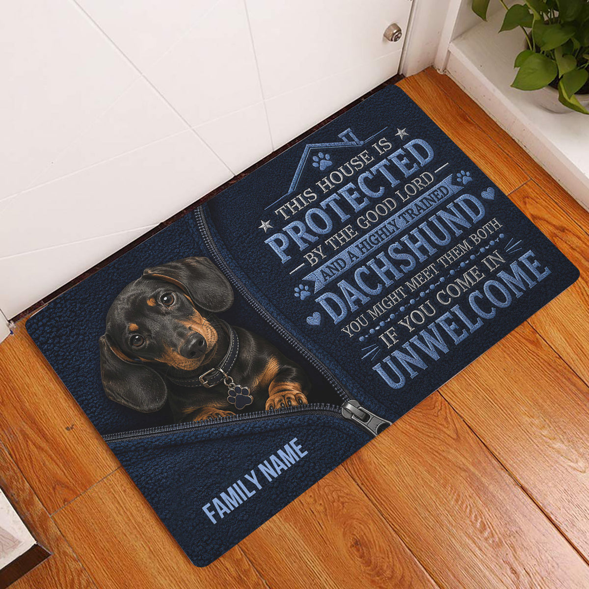Dachshund entryway rug displayed beside a white door on a wooden floor