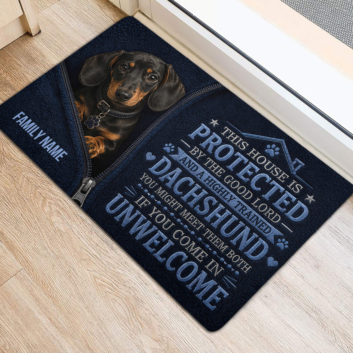 Dachshund door mat placed at an interior doorway with a protective welcome design
