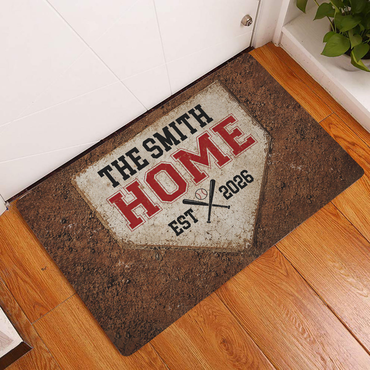 Vintage baseball entryway rug displayed in front of a white door on a wood floor