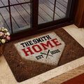 Baseball home plate doormat shown near a glass door with rustic brown and cream artwork
