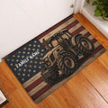 Rustic tractor door mat displayed at a home entrance on warm wood flooring