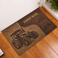 Tractor doormat displayed at a home entrance on warm wood flooring with a vintage farm design