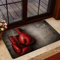 Boxing-themed doormat styled at a glass doorway with red gloves and script lettering