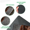 Dachshund doormat detail showing the printed surface, rubber backing, and thin profile