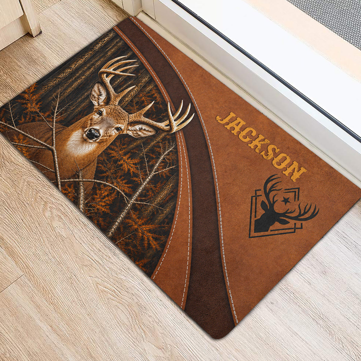 Rustic deer hunting door mat positioned beside a doorway with forest artwork and brown western styling