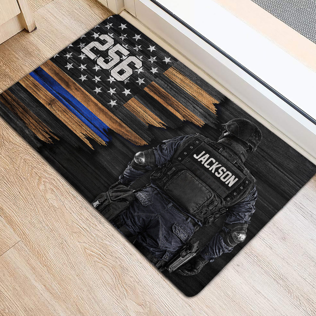 Police-themed entryway rug by a doorway featuring a tactical officer and bold blue and bronze distressed stripes