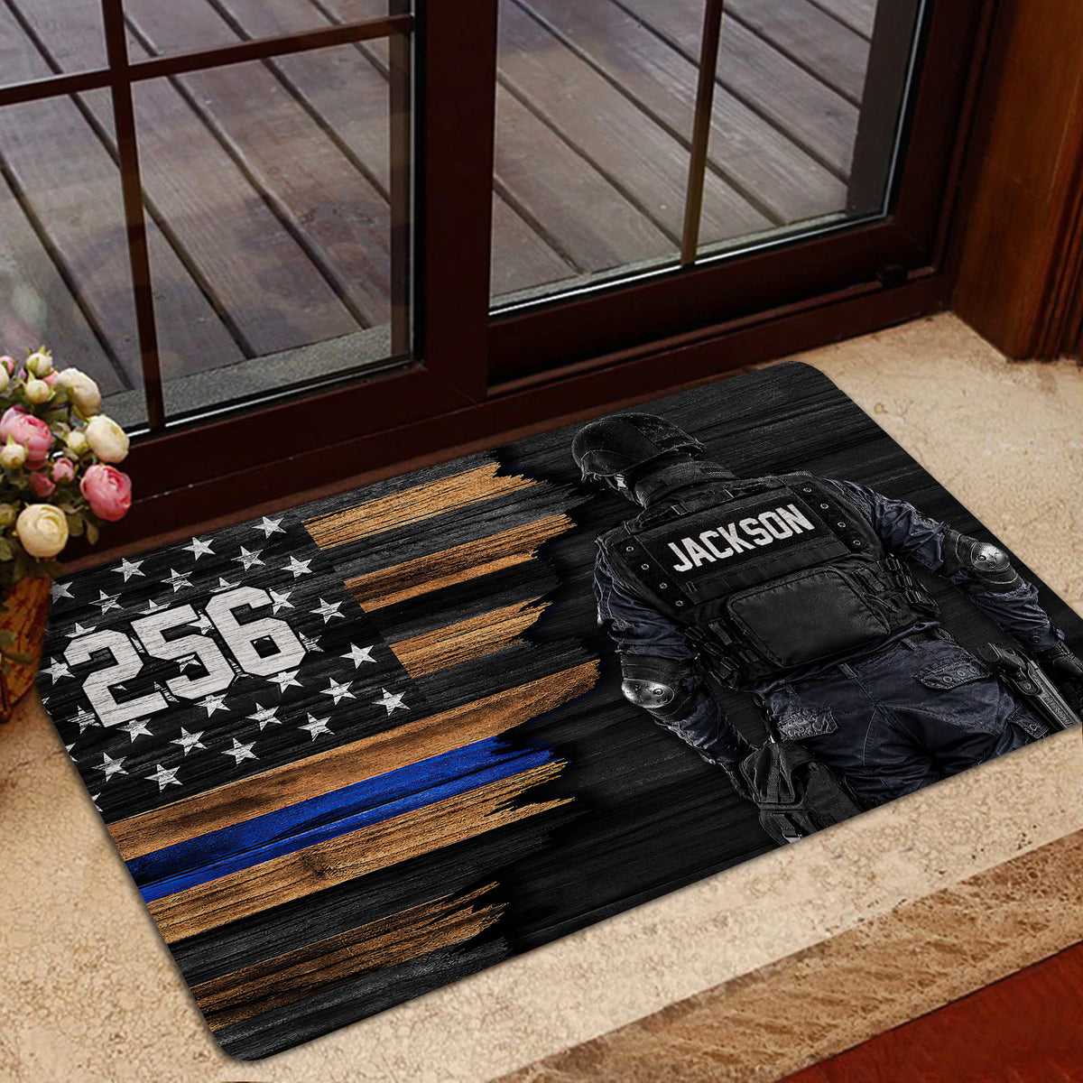 Police doormat staged near glass doors with a tactical officer, star pattern, and patriotic distressed stripe artwork
