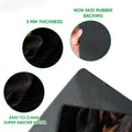 Close-up detail of the dachshund doormat showing the printed top surface and black rubber backing