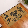 Miniature Schnauzer doormat displayed by a white door on a warm wood floor in a home entryway