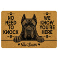 Tan Cane Corso doormat with black illustrated dog portrait, paw prints, bold entryway message, and decorative script