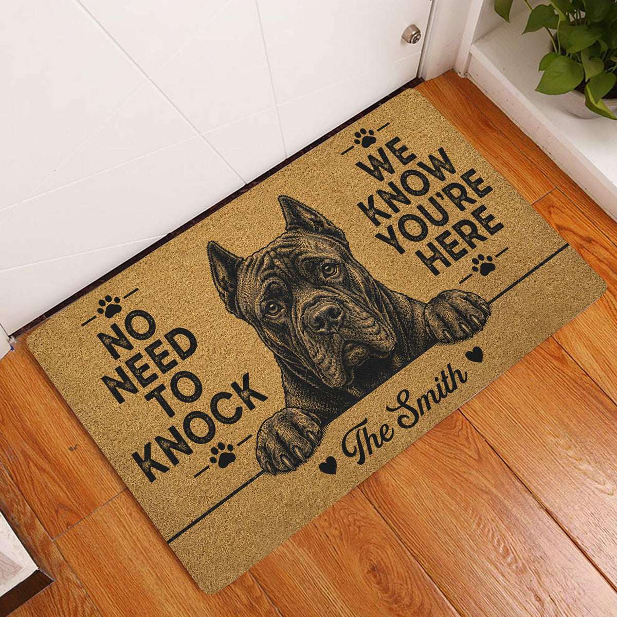 Cane Corso doormat displayed by an indoor doorway on hardwood flooring with bold black dog artwork