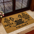 French Bulldog door mat presented at a glass entry door with a warm tan and black illustrated design