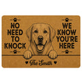 Labrador Retriever doormat with a friendly dog portrait, paw prints, warm tan artwork and playful welcome message