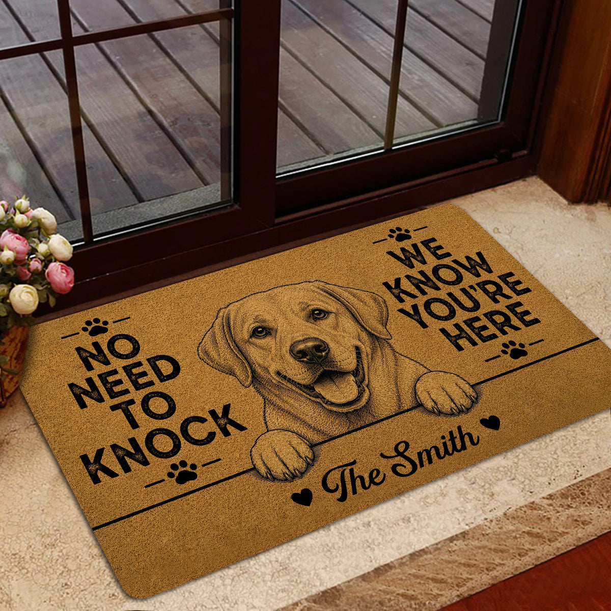 Labrador Retriever doormat presented near a glass entry door with warm home decor and a welcoming design