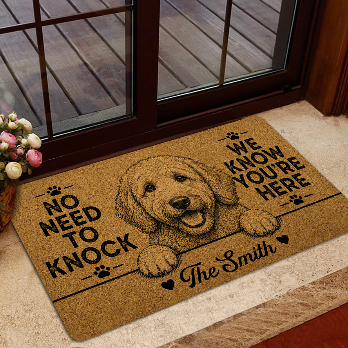 Goldendoodle entryway mat shown near a glass door with tan artwork, black lettering and a friendly dog portrait