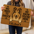 Person holding a Rough Collie doormat featuring a detailed dog portrait and playful entryway message