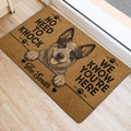 Australian Cattle Dog door mat shown at an entrance, featuring a detailed dog portrait, paw prints and bold lettering