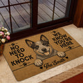 Australian Cattle Dog doormat styled inside a glass doorway with a warm brown dog portrait and playful welcome artwork