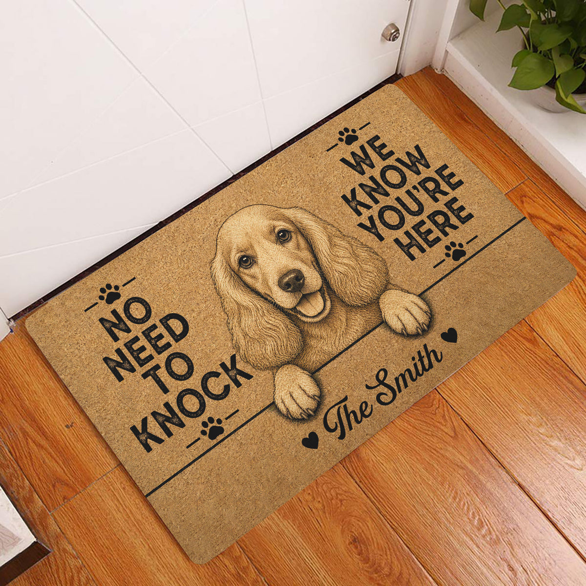 English Cocker Spaniel entryway rug displayed beside a white door on a wood floor