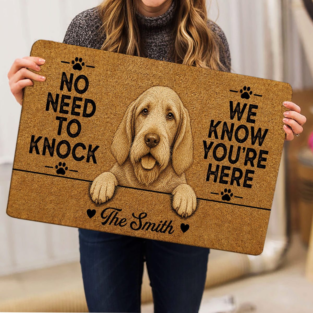 Person holding a Spinone Italiano doormat featuring a detailed wire-haired dog portrait and paw print accents
