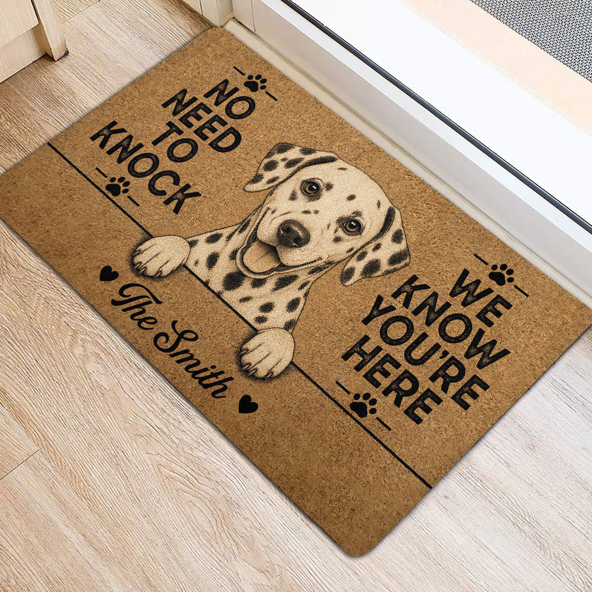 Spotted Dalmatian dog doormat styled at an indoor doorway with a playful message
