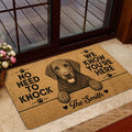 Curly Coated Retriever doormat shown in a home entrance with warm wood trim, glass doors and floral decor