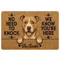 Pitbull doormat featuring a friendly brown-and-white dog portrait, paw prints, and a playful entryway message