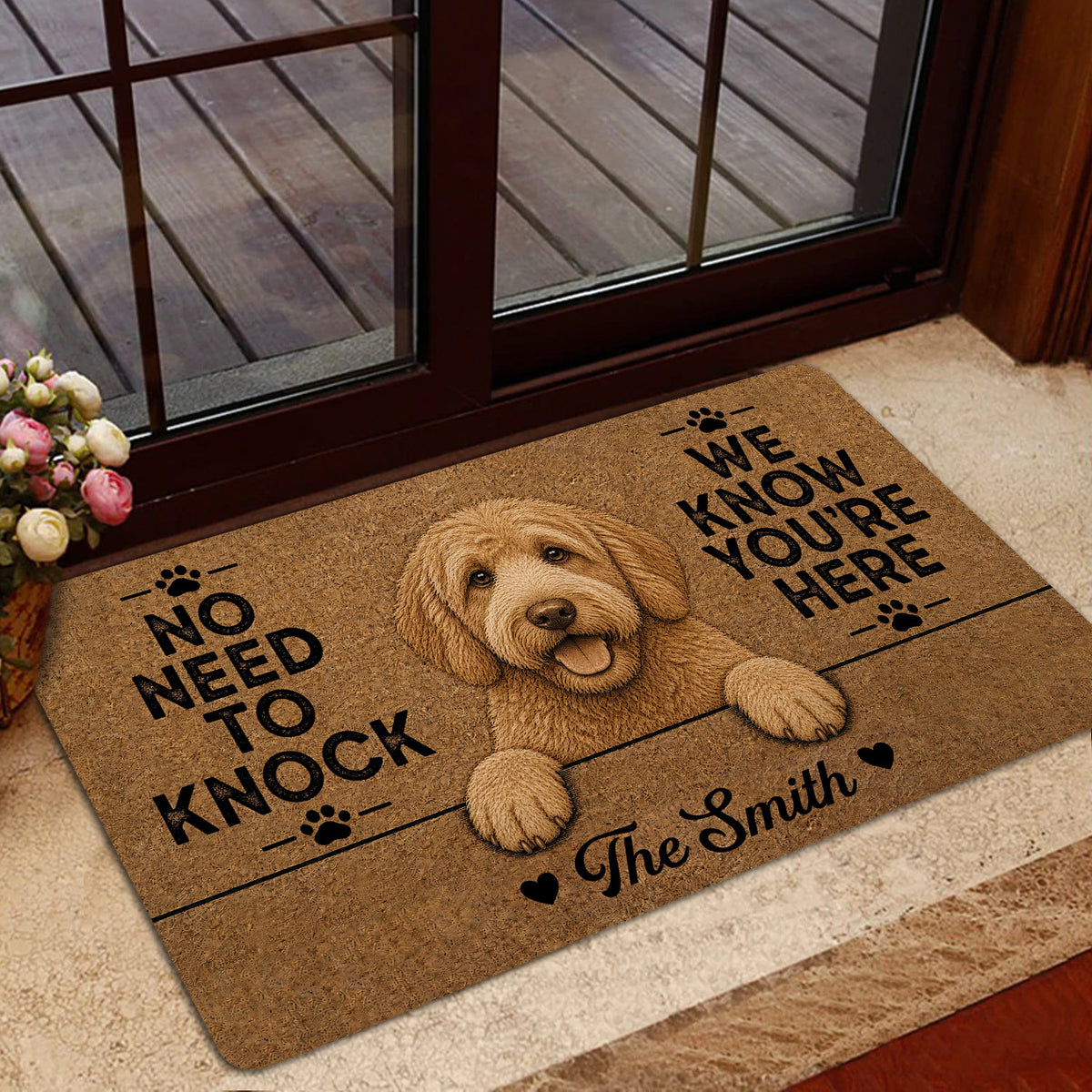 Labradoodle welcome mat styled in a home entryway near a glass door and indoor rug