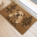 English Bulldog door mat positioned at an entrance on light wood flooring with its illustrated dog design visible