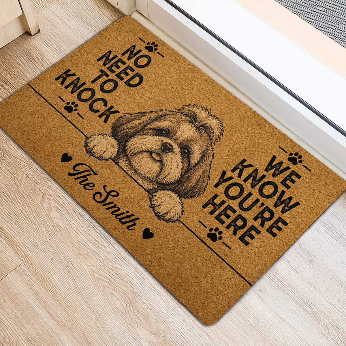 Shih Tzu entryway mat shown on light wood flooring with a playful dog portrait and paw prints