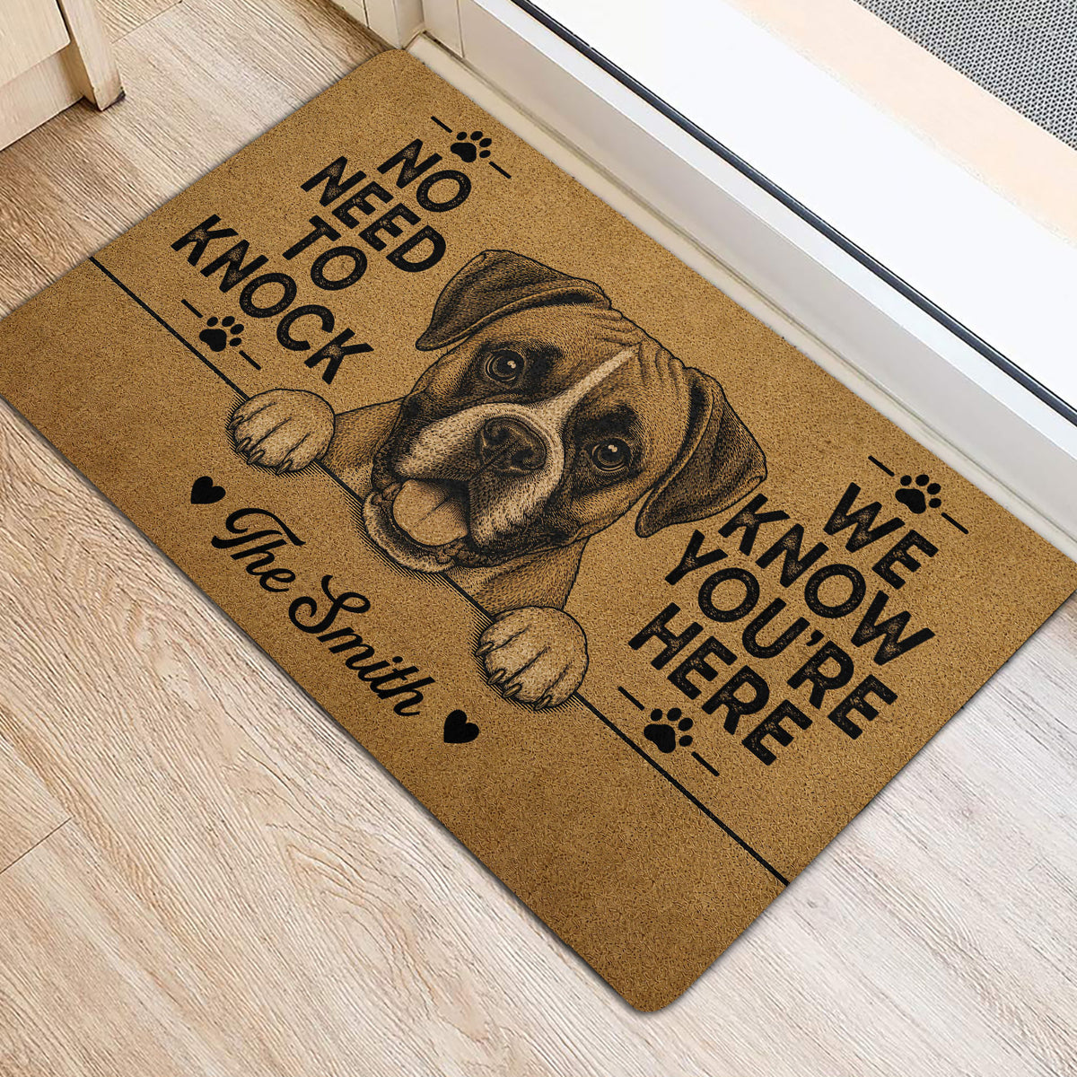 Boxer dog door mat with tan and black artwork placed at an interior entrance
