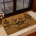 Brown poodle entryway mat shown near a glass door with a detailed dog portrait and welcome design