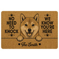 Shiba Inu doormat with a smiling dog illustration, paw prints, welcome message and warm tan artwork