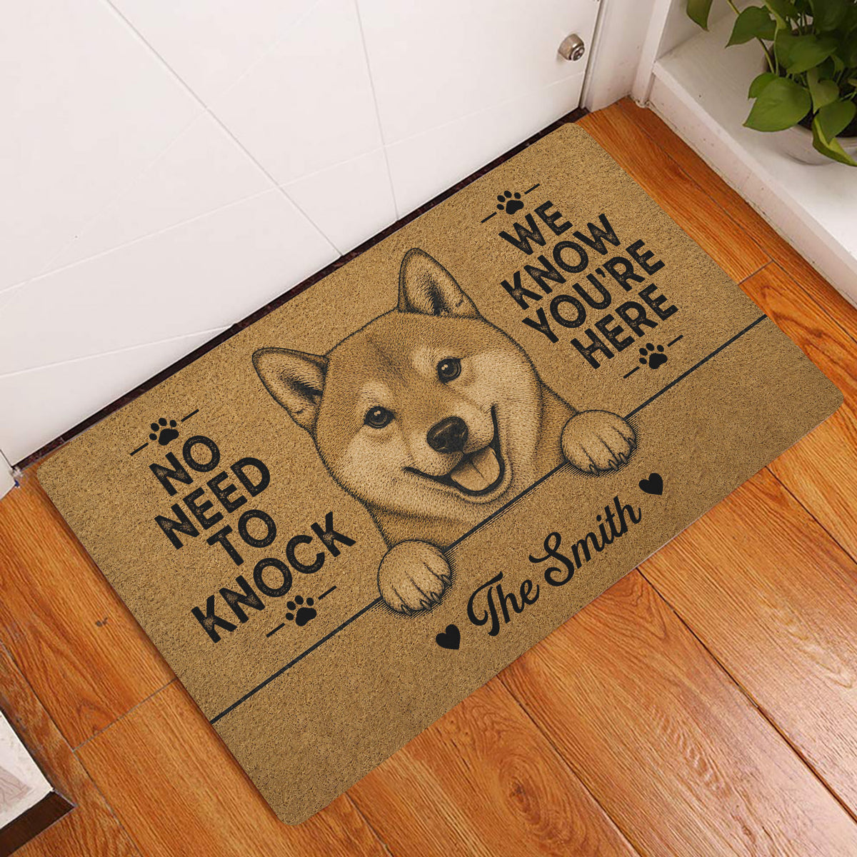 Shiba Inu entryway doormat displayed by a white door on a warm wood floor