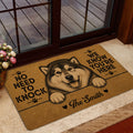 Alaskan Malamute doormat styled inside a glass doorway with warm brown and black artwork