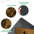 Close-up product detail showing the printed Great Dane artwork, rubber backing, and mat construction