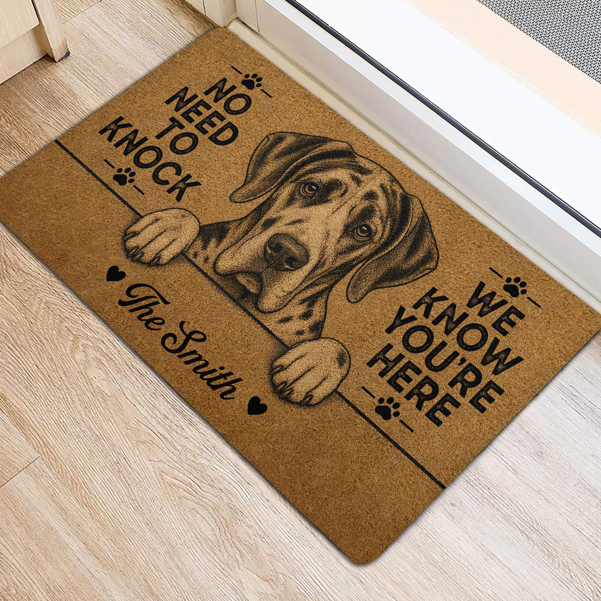 Great Dane entryway mat beside a door featuring a brown and black dog portrait design