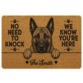 Dutch Shepherd doormat with paw prints, bold welcome message, and warm brown and black artwork