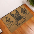 Dutch Shepherd entryway doormat displayed beside a white door on a warm wood floor
