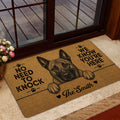 Dutch Shepherd doormat styled inside a home near glass doors and a wood deck