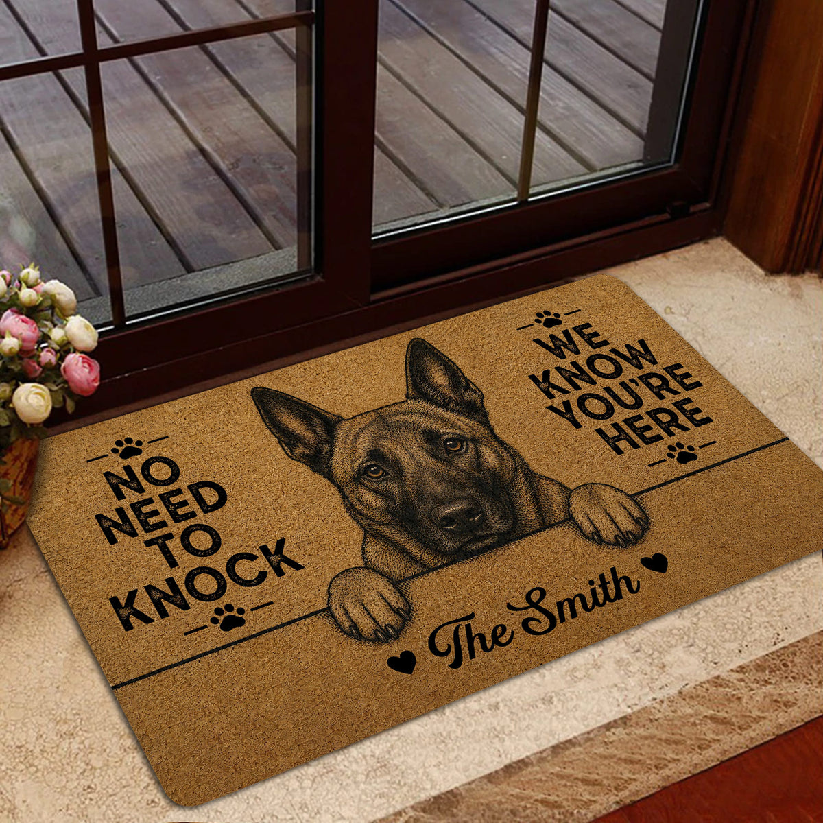 Dutch Shepherd doormat styled inside a home near glass doors and a wood deck