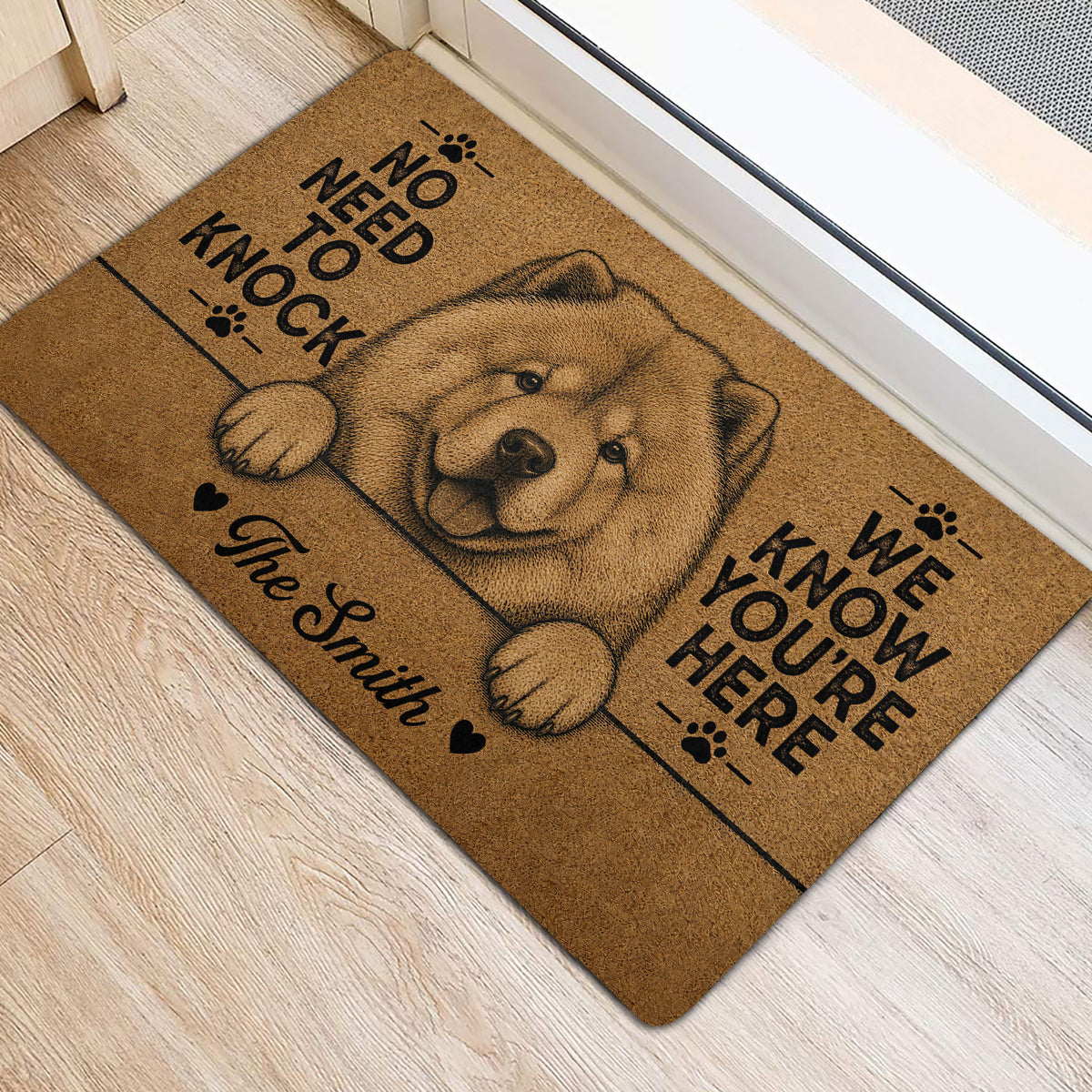 Fluffy Chow Chow door mat placed by an interior doorway with paw prints and bold black lettering