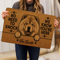 Person holding a brown Chow Chow doormat featuring a detailed dog portrait and playful welcome lettering
