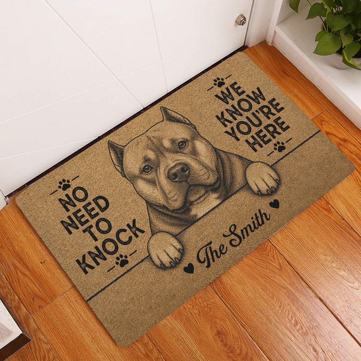 American Bully entryway mat displayed by a white door on a warm wood floor with bold black artwork