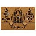 Tan bloodhound doormat with paw prints, humorous welcome message, and illustrated dog portrait