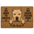 Dogo Argentino doormat with a white dog portrait, paw prints, and bold welcome message in warm brown tones