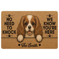 Cavalier King Charles Spaniel doormat with a playful welcome design, paw prints and warm brown artwork