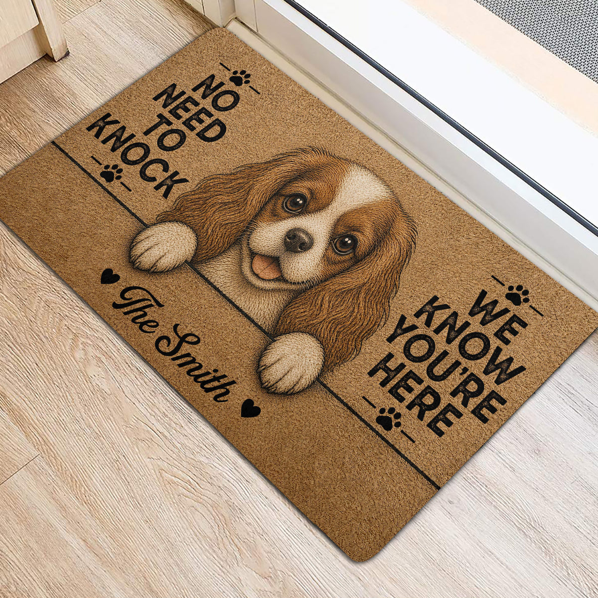 Cavalier King Charles Spaniel door mat styled near a doorway with a detailed dog portrait and paw prints