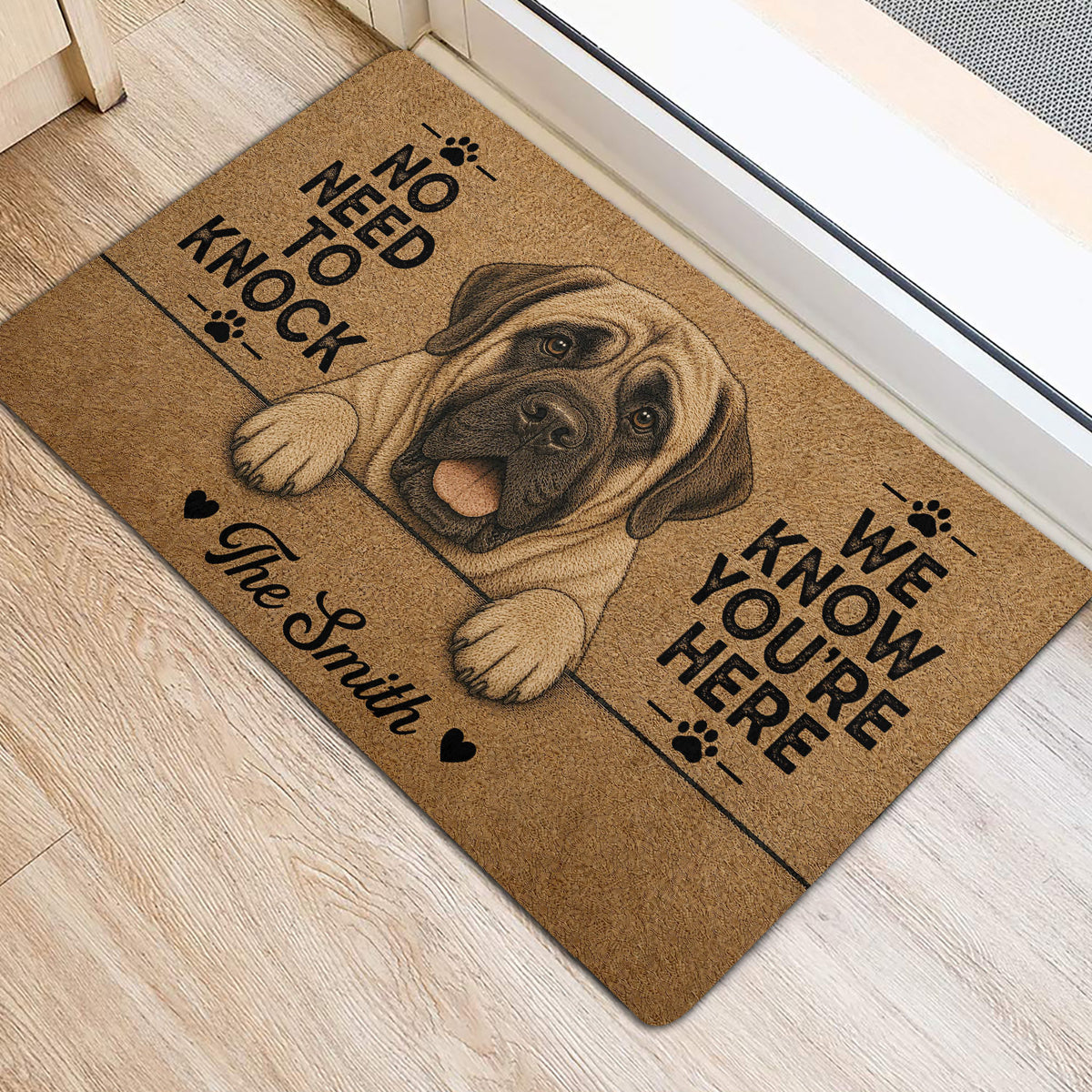English Mastiff door mat staged at a bright home entrance with tan artwork and paw-print accents