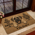 English Mastiff doormat displayed inside a glass doorway with warm wood and neutral entryway decor